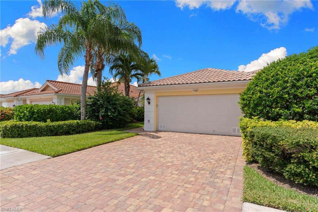 Photo of 7620 Rozzini LN, NAPLES, FL 34114 (MLS # 226027327)