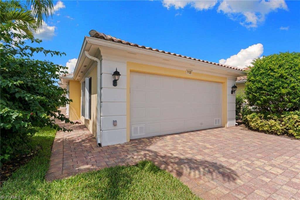 Photo of 7620 Rozzini LN, NAPLES, FL 34114 (MLS # 226027327)
