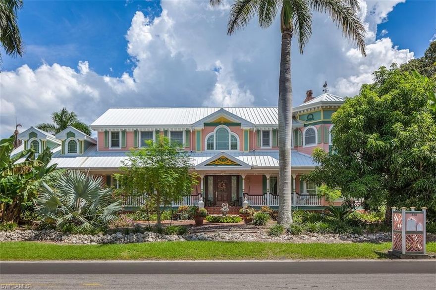 Sprawling, two-story Queen Anne Victorian with the prestigious Gulf Shore Boulevard address is nestled one block from the sugar sand beaches of Naples.  This home features a towering turret, arched windows and an S-shaped pool that is situated perfectly in the sun filled private outdoor space.  The grand two-story foyer with a free standing staircase is just one of the many distinguishing qualities found throughout this 4 bedroom plus den 7 bath retreat that lives like a sublime resort. The home has many elegant finishes yet is still a classic beach residence which highlights touches of Old-Florida style with an inviting front porch, raised-rib aluminum roof and lush tropical fruit trees. The first floor master bedroom is complete with his and her dressing rooms and a peaceful sitting area.  The three-car garage with large attic storage will accommodate several automobiles. The high level of craftsmanship and attention to detail is evident in every room. Known as the “Painted Lady”, this vibrant Bermuda Pink masterpiece represents a rare opportunity to enjoy the very best Naples has to offer.