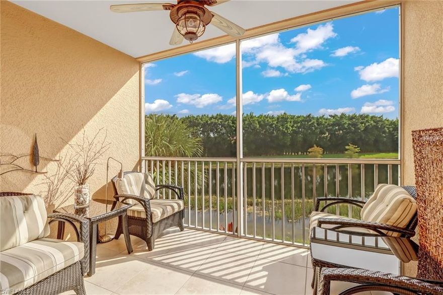 Rarely Available in a lower density building - this TOP FLOOR END UNIT is offered turnkey furnished and comes well appointed. Step out the hurricane impact sliders onto your expansive tile and screened lanai with water views. Meticulously maintained and perfect for the most discerning of buyers. Spanning nearly 1700 square feet under air this maintenance free home features hurricane impact glass windows and an attached 1 car garage. Soaring high ceilings compliment the wood cabinets, granite kitchen, and crown moulding. The owners suite is equipped with a large walk-in closet and en-suite bath featuring both a roman soaker tub and walk-in glass shower. Steps from one of the community's spectacular resort style pools and a bridge away from the community town center - this home needs to be seen to be appreciated. Ample guest parking right across the street. Villagio provides 24 hour gated security and a premium amenity package with multiple swimming pools, tennis, fitness center, movie theater, ice cream bar, and full menu cafe open 7 days a week. All this and more with low HOA fees of only $390/mo - water, premium cable with DVR + Voice Remotes and high speed internet included!