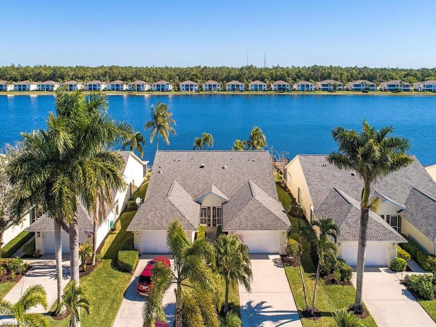V4560  180 degree expansive lake views over a 37 acre spring fed lake, Quiet. Short drive to Old Naples and the beach. Lakeport Villas is a condo association of 50 attached villas with lake frontage. Relax on your recently refurbished dock (shared with attached neighbor). Tasteful turnkey furnishings. New Roof 2018. New Expanded Lanai Screen Enclosure. Updated appliances. Vaulted ceilings, comfortable split bedroom floor plan; great room, eat-in kitchen with pass-through and granite counters. Sliders to the extended screened lanai from the great room & master bedroom. 2 car garage with freshly coated floor. A long driveway for plenty of guest parking. Hurricane Shutters all around; electric lanai shutter and accordion shutters on the windows. Crown Pointe offers numerous amenities including; Clubhouse w/ kitchen facilities, Heated freshwater pool, nicely equipped exercise facilities with men & women's locker rooms & sauna, Boating (electric motor or paddle). Fishing from you dock or boat. Three lighted tennis courts. Scheduled social activities. Adjacent to a Collier County maintained green-way for walking/bicycling. Pet friendly. A real value, wonderful lifestyle & gorgeous view!