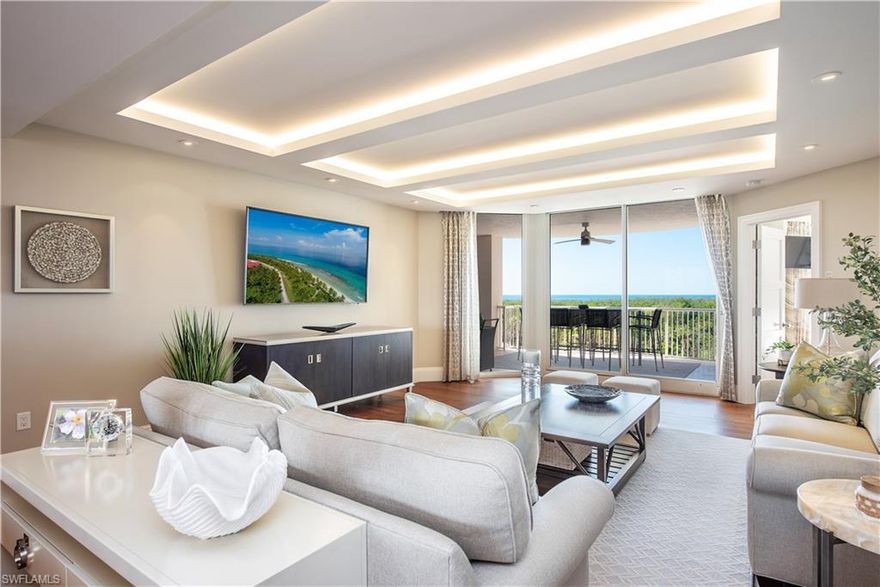 Enter a world of sleek, stylish, sophistication in this three-bedroom three-bath luxury tower residence with a beautiful view of the Gulf of Mexico. Finally, the opportunity to purchase a property that has undergone a total renovation with spectacular high-end backgrounds and exquisite finishing details. Instant gratification personified! The dramatic custom lighting and stunning "Leathered Walnut" wood flooring provide the perfect backdrop for the modern coastal lifestyle. Enjoy a fabulous well-equipped gourmet kitchen with upgraded Thermador appliances including a double oven, cooktop, under-counter microwave, and separate wine refrigerator. This fabulous kitchen has a generous workspace and incredible seating capacity for 12! The main living area is filled with natural light from dawn until dusk, but the spacious lanai is the place to be at the end of the day as you watch the sun sink into the Gulf. Walking from room to room is like turning the pages of a home design magazine featuring the most beautiful interior spaces for relaxing and entertaining. Kohler touchpad controls for the master shower and the state-of-the-art sound system with invisible speakers built directly into the walls/ceiling throughout the residence are examples of the high-tech unique features of Unit #403. This residence represents the pinnacle of quality, craftsmanship, luxury, and style. It truly shows like a model and furniture is included. Two deeded garage spaces in the secure garage below the tower are included as well as a storage locker on the garage level. St Raphael was built with impact-resistant glass on all windows and sliders throughout the building and was the first tower on the Boulevard to be built with 9' ceilings. The prime location of St Raphael is just steps from walk-up tram station #6 and boardwalk to the beach club, the amazing St Raphael amenities and incomparable Pelican Bay lifestyle complete the package.