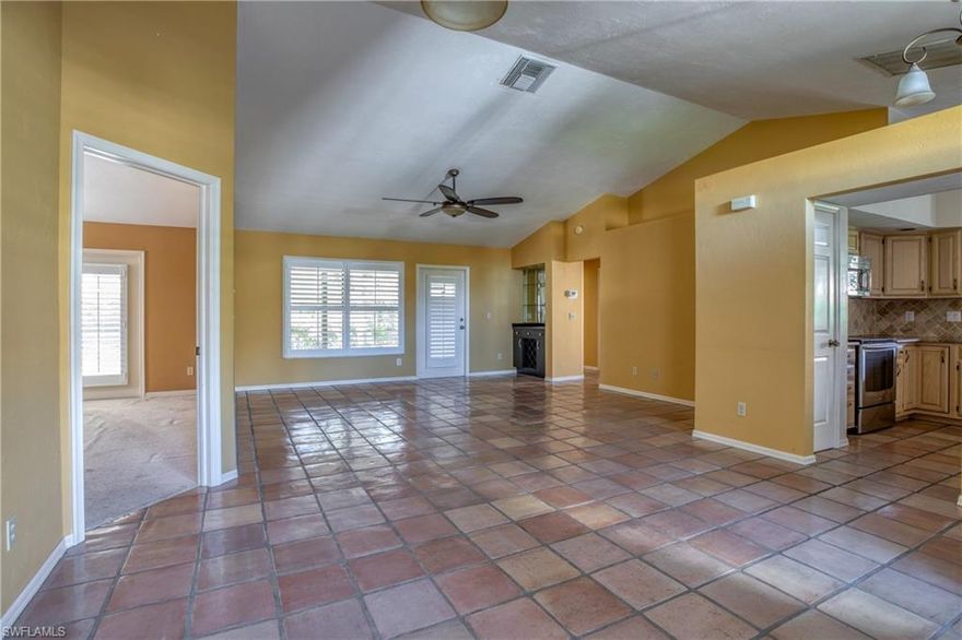 LOWEST PRICED single family home here, an opportunity to get into this desirable GOLF community at an entry level price point for single family-  price reflects the opportunity to update home your way! Hard parts are done!  ROOF- only about 5 years old! Kitchen and baths have updates.  AC system updated in last few years, now just paint and do floors! Gated Country Club Community, with exclusive golf membership ($35,000 value!). Granite countertops, stainless steel appliances, backsplash in kitchen. Plantation shutters throughout! Vaulted ceilings and open floorpan, with split bedrooms, so master has a private feeling. Large screened lanai perfect for grilling, view offers total privacy. GOLFERS- cart path adjacent, so you can be at Club quick! Plus, cart path provides additional distance to neighboring home, creating wider open feel. Hunter's Ridge is a an exclusive golf community, with private memberships, NO CDD's, and low fees! Not a bundled club, so getting a tee time is easy! Hunter's Ridge has gorgeous Activity Center, community Pool and Clubhouse, Fitness, Poolside Cafe, Dining Room, Grill Room, Tennis Courts, Pickleball, etc. Just 6 miles to award winning Barefoot Beach!