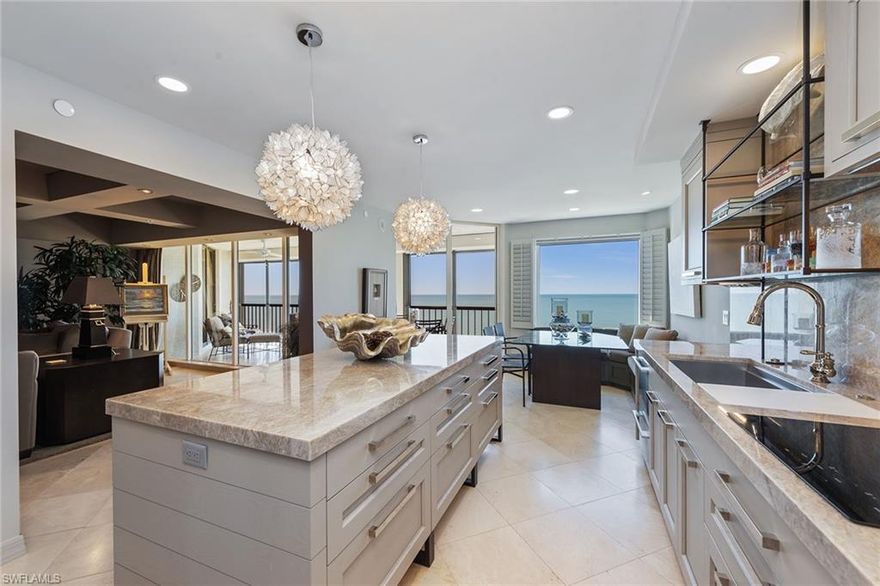 Gorgeous Gulf views and designer style featuring an updated kitchen by AlliKriste & BCB with a Wolf induction cooktop and microwave, stainless farm style sink, Fisher & Paykel dishwasher, Sub-Zero fridge, bonus refrigerator beverage drawers, and a built-in breakfast banquet in the kitchen. There is plenty of room for entertaining with large center island and with separate guest rooms, large open lanai’s both front and rear all with motorized hurricane protection, and tastefully decorated living areas to relax. The Carlysle has completed refreshing upgrades to common areas and Carlysle residents enjoy a beachfront pool, well-appointed fitness room, and a courteous and professional staffed front desk in the lobby. Experience Bay Colony and Pelican Bay beach clubs with attended beach services and Bay Colony Tennis Club.