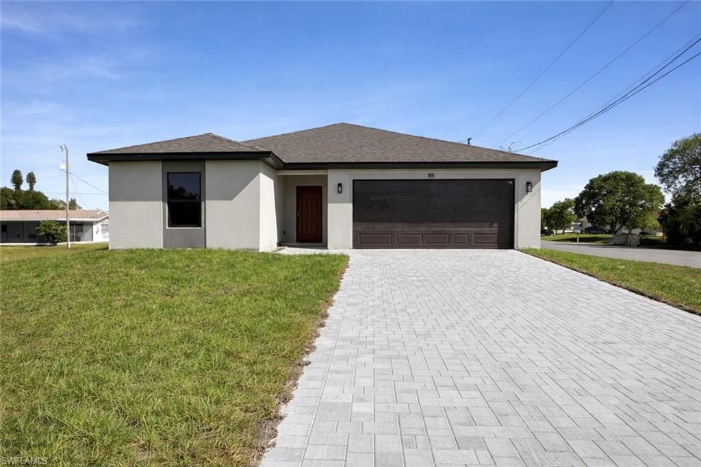 Photo of 108 Indiana PL, LEHIGH ACRES, FL 33936 (MLS # 226005215)