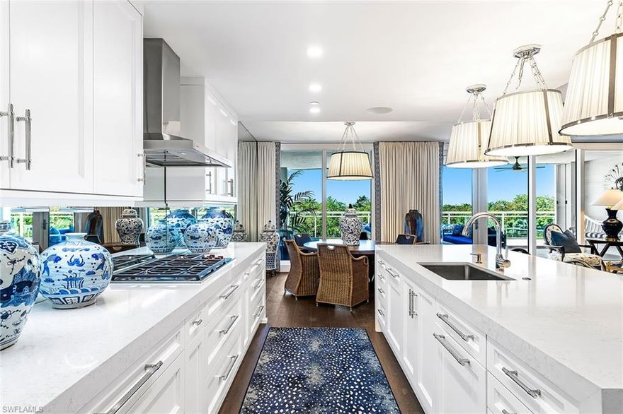 Luxury high-rise living awaits you at the sophisticated and elegant towers of Kalea Bay. Available now for immediate occupancy is the well situated unit 305 in Tower 1. Enjoy spacious open living in this 3 bedroom, plus den, 3 1/2 bath residence. Designer finished in beautiful hand picked selections like custom wood cabinetry with built in Sub-Zero refrigerator, oversized kitchen island with waterfall edge quartz countertops, owners suite features his and her vanities, modern free standing soaking tub, custom closets, additional bedrooms are en suite, and the third floor units are adorned with an oversized balcony overlooking lush landscaping. A quick elevator ride to the rooftop and you are graced by the tower amenities; rooftop pool, exercise area, lounge room, and grilling area. This is truly the best place to experience the famous Naples sunsets and enjoy the beautiful lifestyle Kalea Bay has to offer. The Club at Kalea Bay is always available for your pleasure; resort style pools and spa, two restaurants, kids area, tennis, pickleball, state of the art fitness center, fire pits, and guest cottages. Don't wait long to schedule your tour of this magnificent residence!