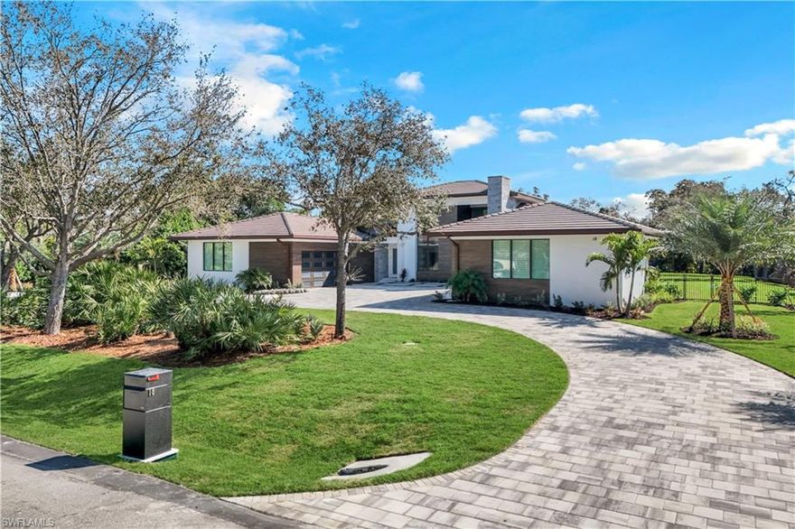 NEW CONSTRUCTION WITH WARRANTY- FURNISHED & READY FOR OCCUPANCY - Located on over an acre of land in Pine Ridge, yet less than 2 miles to the beach, this custom home by Arthur Rutenberg Homes features a modern design with luxurious warmth.    The main house features a spacious great room, gourmet kitchen, casual dining area, 3 ensuite bedrooms, a den, flex room, prep kitchen, home delivery center and 4 car garage. Attached by an extended covered cabana and outdoor kitchen is a Casita that offers a private bedroom, bath, kitchen and living room..... perfect for visiting family.   With over 900 sf of covered outdoor living space surrounding the resort style pool/spa, outdoor kitchen and fireplace, this home is perfect for entertaining family and friends.