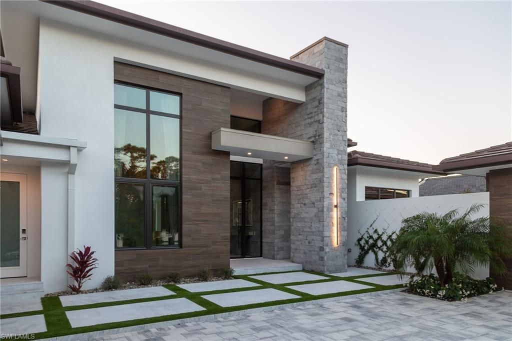 Photo of 18 Caribbean RD, NAPLES, FL 34108 (MLS # 223025774)