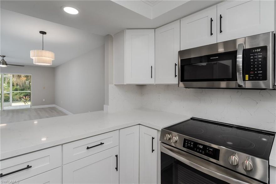 Completely Renovated!! Every square inch of this unit has been remodeled!! New high end cabinets a spice rack and a lazy Suzan inside the corner cabinet! Beautiful Quartz Counter tops and back splash!! High end SS appliances. Beautiful high end vinyl flooring throughout the unit along with custom base boards, fresh paint and recessed lighting throughout!! Tastefully designed uniform hardware throughout the unit (including door hinges)!! New door frames, new high end doors and all new windows and sliders!! All new fans and lighting!! The unit has a carport assigned!! 2023 Water heater. The community pool is a short walk from the unit (heated during the winter). Only 10mins to the beach and only 5 mins to Publix and restaurants!! 55+community. Seller motivated!