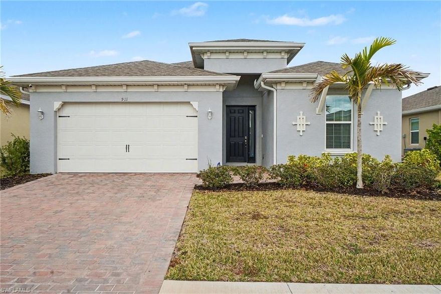 Welcome to 911 Stonewater Lake Terrace, located in one of Cape Coral’s most desirable and up-and-coming communities. With the builder nearly sold out, this is a rare opportunity to own in a highly sought-after neighborhood that continues to grow in value and popularity.

Built in 2023 and meticulously maintained, this home still feels brand new. Offering 3 spacious bedrooms plus a large den, the flexible floor plan is ideal for today’s lifestyle—perfect for a home office, gym, playroom, or additional guest space.

Enjoy peaceful lake views with a beautiful fountain feature right from your backyard, creating a serene setting for morning coffee or evening relaxation.

Inside, the home showcases modern finishes throughout, including wood-look tile flooring, white shaker cabinetry, and elegant granite countertops. The open-concept design provides both functionality and style, ideal for entertaining or everyday living.

Additional highlights include an oversized 2-car garage with ample storage space and thoughtful design elements that combine comfort and sophistication.

This is your opportunity to own a like-new home in a thriving Cape Coral community—schedule your private showing today.