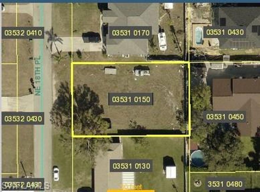 Grate investment  residencial lot 1429 NE 18th Place Cape Coral  is a home located in Lee County with nearby schools including Dr. Carrie D. Robinson Littleton Elementary School, Tropic Isles Elementary School, and Caloosa Elementary School.