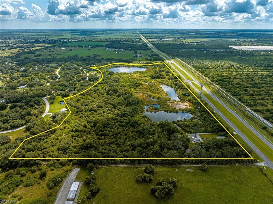 Prime Investment in an Opportunity Zone – 55.48 Acres
This unique 55.48-acre site in Glades County offers a rare combination of investment potential and permitted mining operations. Conveniently located on State Road 80—just 12 miles east of LaBelle and 20 miles west of Clewiston—the property is situated for both accessibility and future growth. The parcel includes a 22-acre wet retention area (mine) and 2.86 acres of wetlands, with a SFWMD Mining Permit (Environmental Resource Permit No. 22-00276-P, would need to be renewed) for the Mid Oaks Mine project. The approved mining plan allows for on-site dewatering and a rock-washing operation, supported by two monitoring wells already in place.

Beneath the surface, the land is rich with valuable materials including lime rock, silica sand, a 5–7' layer of fine conch shell, and other high-quality aggregates—verified by the seller and the previous engineer-owner who played a key role in securing the permits. While there are no permanent structures or roads on the property, extensive due diligence materials are available for review, including a boundary survey, permit documents, soil boring reports, and monitoring well data.

With its Opportunity Zone designation, active mining authorization, and wealth of natural resources, this property presents a compelling opportunity for investors, developers, and mining operators alike.