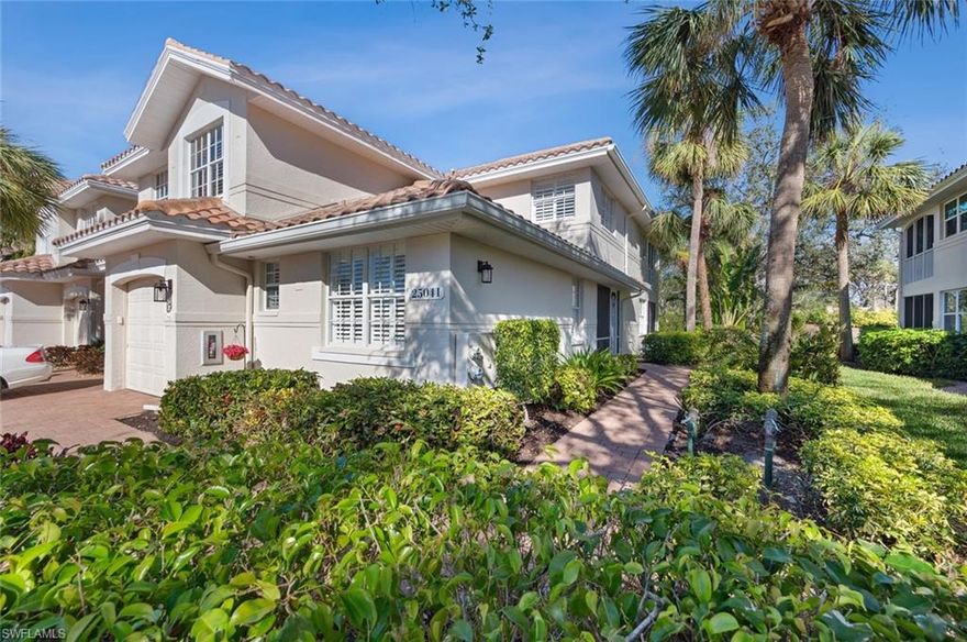 Great remodeled first floor coach home in desirable Southbridge. Wonderful lake view enhanced by a spray fountain that lights up at night. The large, tiled Lanai has glass sliders that give you the comfort of AC & heat with the option to slide them open for fresh outdoor air. The lanai's interior sliders have been removed and the floor has been raised to be level with the interior floors. Offered Turnkey/Furnished with stylish furniture and accessories. 16" designer tile floors and Plantation shutters throughout. Kitchen has been updated with granite counter tops. tile backsplash and stainless appliances. Master bath has Quartz counter tops, new mirror, lighting, frameless shower enclosure and comfort height toilet. Roofs were replaced about five years ago as well as paver driveways and walkways. 
Great location just steps away from Pool complex and mailbox station. (Largest pool in Pelican Landing) Also walking distance to Publix shopping center and a 5-minute drive to Coconut Point Mall.
Pelican Landing amenities include a private Island beach, Tennis, Pickle Ball, Bocce, Fitness CBnter, Canoe/kayak center, Marina with boat slips, Sailing center, Fishing pier, Children's play park, Butterfly Garden and more. Optional golf memberships at The Nest Golf Club with a golfers delight 36-hole golfers delight subject to a waiting list.