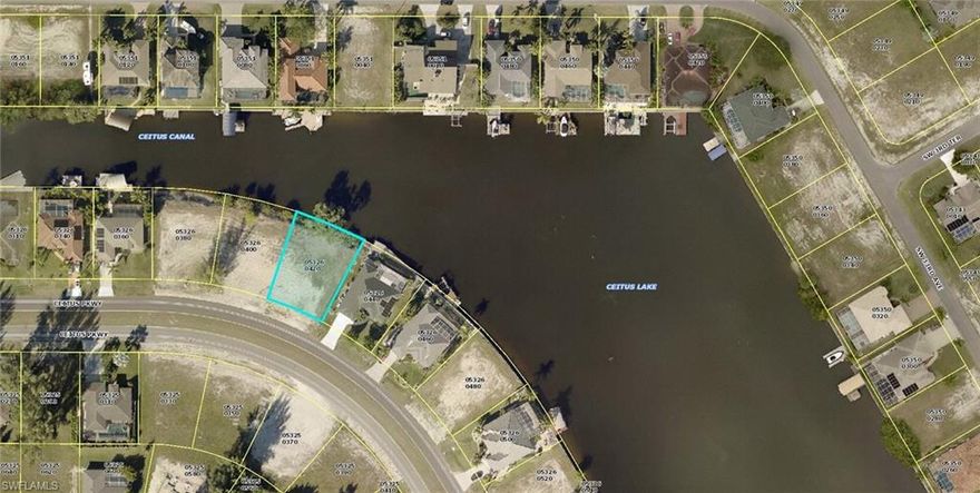 Located on Ceitus Lake with a big water view and great boating access and 100' of water frontage.  This lot has city water and sewer available, making it a perfect place for your new custom waterfront home. This lot features quick boating access to Matlacha Pass, and is located in an area of newer custom waterfront homes.  Located close to Matlacha for dining, shopping and entertainment, and just blocks away from the Burnt Store Rd Publix.  The Pine Island Road corridor offers more convenient shopping and easy access to I-75 and the International Airport.