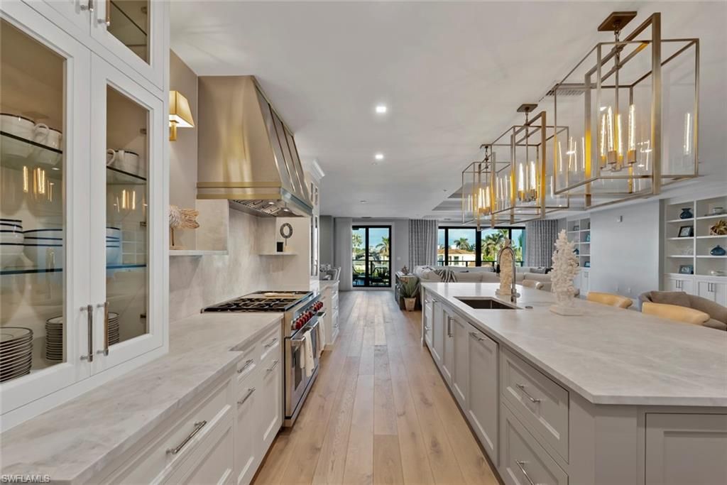 Photo of 1820 Gulf Shore BLVD N #302-303, NAPLES, FL 34102 (MLS # 226000934)