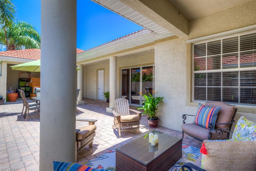 Enjoy complete privacy in your spacious courtyard.   There is plenty of covered space with shade for dining and plenty of space to soak in the Florida sunshine. The kitchen has abundant cabinet space, pantry, breakfast bar, center island, backsplash, a breakfast area and a wet bar.  There is a separate dining area for entertaining your guests.  The living room is large with lots of windows to let in the natural light.  The master suite is on the ground floor with a large walk in closet, wood floors, linen closet, walk in shower and dual sinks.  Upstairs you will find 2 en suite bedrooms both with laminate flooring, walk in closets, and plenty of natural light.  The laundry has extra cabinets and a sink. Other features:  rain gutters, newly cleaned grout (7 yr guarantee), paver brick courtyard, crown molding in dining/living area, 2 a/c units, surround sound downstairs, a/c 2015, w/h 2018, maintenance free exterior.  Amenities include: 3 pools, tennis and sports courts, fitness, play area and more. If privacy in an amenity rich community is what you are looking for…this home just might be the right one for you.