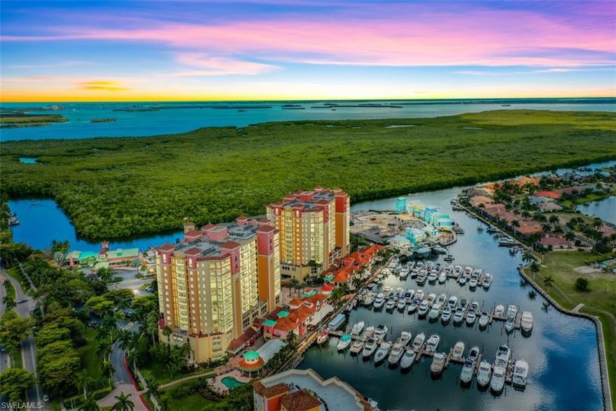 RARE TWO BEDROOM TWO BATH CONDO ON THE 13TH FLOOR WITH UNOBSTRUCTED VIEWS AND HIGH ENOUGH OVER NEW TOWNHOUSE PROJECT AND THE FUNKY FISH HOUSES IN THE LUXURY CONDO COMMUNITY OF CAPE HARBOUR, THE 13TH FLOOR OFFERS BEAUTIFUL SWEEPING VIEWS OUT TOWARDS SANIBEL ISLAND ENCOMPASSING THE MARINA, THE SPREADER CANAL AND THE RIVER WITH THE MOST BREATHTAKING SUNSETS YOU WILL EVER SEE. ENJOY THE BOAT TRAFFIC AS WELL AS THE OCCASIONAL MANATEE OR DOLPHIN RIGHT FROM YOUR BALCONY, TAKE THE ELEVATOR TO THE COMMUNITY RESTAURANTS, BARS, ENTERTAINMENT, BOUTIQUES AND COFFEE SHOP, TWO POOLS AND A CLUB HOUSE THAT OFFERS A FITNESS ROOM, TENNIS, PICKLE BALL AND A PLAY AREA FOR THE KIDS. RESERVE THE CLUB HOUSE FOR YOUR PRIVATE FUNCTION. MAKE YOUR SHOWING APPOINTMENT TODAY AND BE PREPARRED TO FALL IN LOVE WITH THESE INCREDIBLE VIEWS.