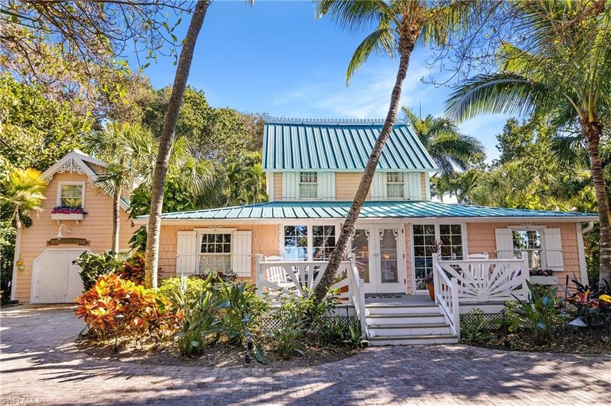 This Old Florida charmer "circa 1910" has gingerbread trim, shaker siding, metal roof and is surrounded by a leafy hammock of mature tropical vegetation. Situated in the exclusive Gulf-to-Bay stretch of Captiva Island. Enter this nostalgic, true Cracker-style cottage with white wood shutters on the windows, a double French door entry, wood beamed ceilings and wood floors to a cheery, comfortable home filled with years of family memories. Just over an acre, this family compound has it all and brings a lure of living in a tropical climate on the Gulf of Mexico. The main house features 3 bedrooms, 2.5 baths, living room, family room, dining room, kitchen and an open patio deck that looks over the open, heated pool. There is a separate single car garage with a guest suite above that offers a kitchenette, bedroom and full bath. Take a walk on one of the many paver walkways throughout the property to the "Secret Garden" and the dock w/lift. Enjoy the private path to the beach!!