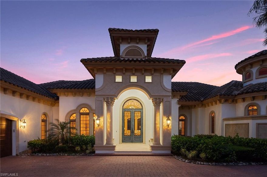 CAPTURE a rare opportunity to embrace gracious lakefront living on the private island of Isola Bella. This 4-bedroom 4.5 bath (+ den/home office) Grand Estate water frontage home is set against a backdrop of breathtaking views.   The exclusive island neighborhood is connected to the mainland by a neo-classical bridge and features paver streets and lush landscaping.  This gracefully designed residence flawlessly combines a modern airy aesthetic with Mediterranean charm.  An ambiance of sophisticated elegance pervades the architecturally striking over 5200 square feet.  The chef’s delight kitchen with custom cabinetry flows to a great room with vaulted ceilings, wet bar, fireplace, and an indoor dining area.  All major rooms are encased by picture windows and spectacular views. 
Entertain under the stars on the expansive fully equipped lanai or escape by boat from your private dock and take in the beauty of 700 acres of freshwater lakes.  A rarely available dream home nestled inside the gates of the award-winning amenity rich community of Miromar Lakes.