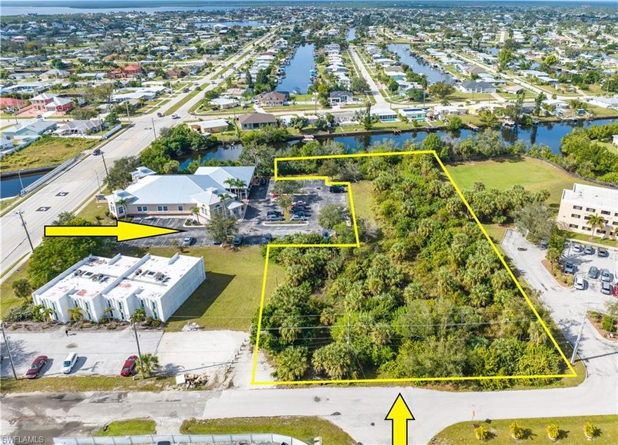 ZONED COMMERCIAL/MULTI-USE, this 1.52 ACRE waterfront lot off Edgewater Drive in Port Charlotte, and less than a mile from Sunseeker Resort, is prime for investment and development. Additional site specific details, photos and recent survey available. Direct access from both Edgewater Dr. and Lister St. Quick and convenient access to US-41 and I-75.