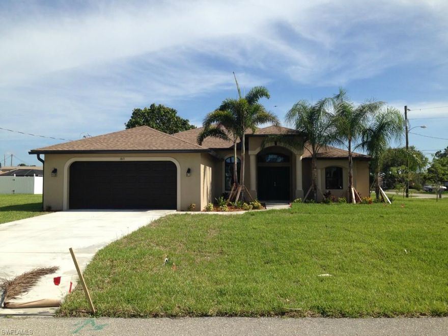 BRAND NEW, NEVER LIVED IN & READY NOW!  4 BEDROOM, 2 BATH GREAT ROOM DESIGN HOME LOCATED OFF DEL PRADO BLVD & ACROSS FROM GULF ACCESS HOMES.  SITUATED ON A CORNER 3 LOT SITE WITH ALL ASSESSMENTS PAID IN FULL & PLENTY OF ROOM TO ADD A POOL. Great location with easy access to dining, shopping and medical offices. Some features of this home include: granite counter tops in kitchen and baths, kitchen cabinets have under cabinet lighting, porcelain tile on all floors except carpet in bedrooms, stainless steel appliances to include side by side refrigerator, smooth top range, dishwasher and microwave.  This home has approx 1990 sq.ft of living area, an inside laundry room with deep sink, irrigation system, floritam sod, upgraded landscaping and it is NOT in a special flood insurance zone so flood insurance is NOT MANDATORY.