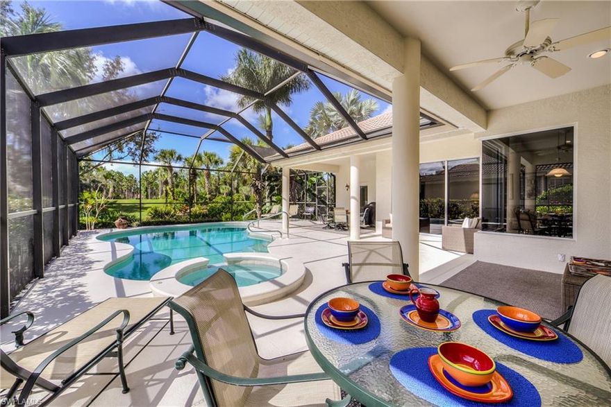 This immaculate 4 bedroom, 3 bath Sterling model is one of the most popular floorplans in Crown Colony. The main living room and dining room are on the entry end of the house and leads to the open kitchen and family room with a great pool and lanai view.  Plantation shutters are installed on most windows. The kitchen has wood cabinetry and hard surface countertops as well as a wet prep island.  Neutral tile on the diagonal runs through the entire living area. Sliders from the living room, family room, and master bedroom lead to the lanai.  The furnished lanai offers several varied covered areas for relaxing, dining, and entertaining next to the pool and spa.  The tropical view has a background of the elevated 11th tee and the preserve area behind it.  Xfinity fiber optic cable for 4 HDTVs, DVR & high-speed internet, all lawn & tree maint, the well-equipped fitness center, community pool and Har-Tru tennis courts are all included as part of low $1,219 qtr dues.  Included Xfinity products alone are worth over $600 per quarter, and lawn & tree maintenance makes Crown Colony HOA dues very reasonable.  Crown Colony Club social or golf memberships are totally optional.