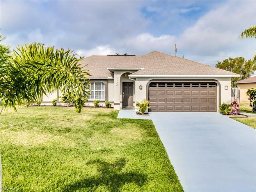 A meticulously updated gem located in the highly desired SW Cape Coral market area. The home boasts superior location to all essential services, schools, parks and major thoroughfares. Enjoy the sunset (rear Western Exposure) from the comfort of your over-sized screened porch and large fenced backyard (Plenty of room for a custom pool). The updates and upgrades throughout entire home will make it feel "Like New". The exterior is freshly custom painted. The kitchen features granite countertops, custom island/cabinetry with a built in wine chiller, stainless steel appliances and high end range with vented exhaust fan. The 18" tile and top of the line pergo flooring tie everything together. The master bathroom have also been completely updated. Master Bath includes large shower, his and her sinks and dual walk-in closets. ALL UTILITIES ARE IN AND HOOKED UP. ALL ASSESSMENTS PAID!! Don't miss out as this will not last long.