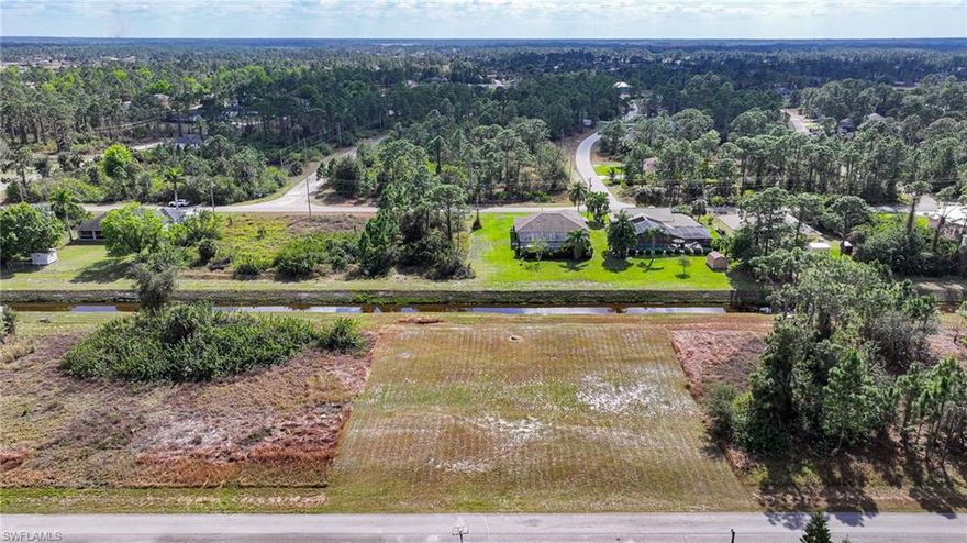 Premium oversized lot nestled right in the heart of Lehigh! Nice quiet area close to everything, open land with canal view backing. Start planning to build your dream home today!