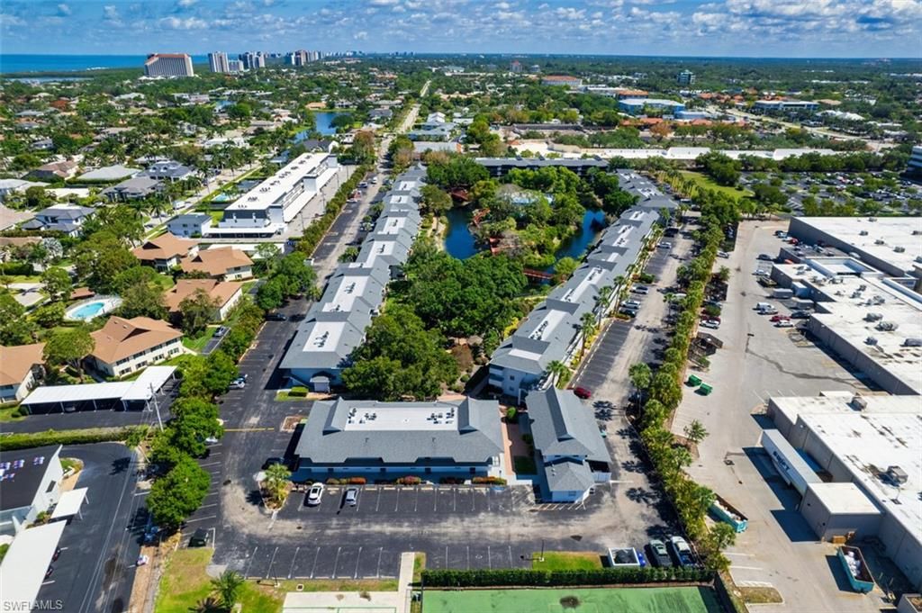 Photo of 600 Neapolitan WAY #153, NAPLES, FL 34103 (MLS # 225047537)