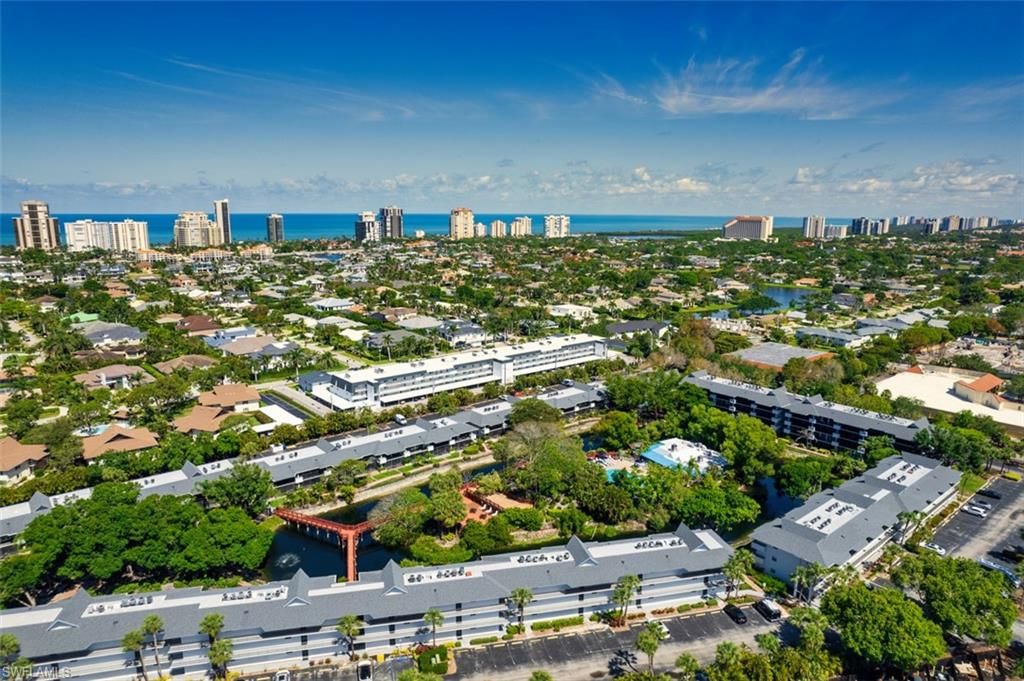 Photo of 600 Neapolitan WAY #153, NAPLES, FL 34103 (MLS # 225047537)