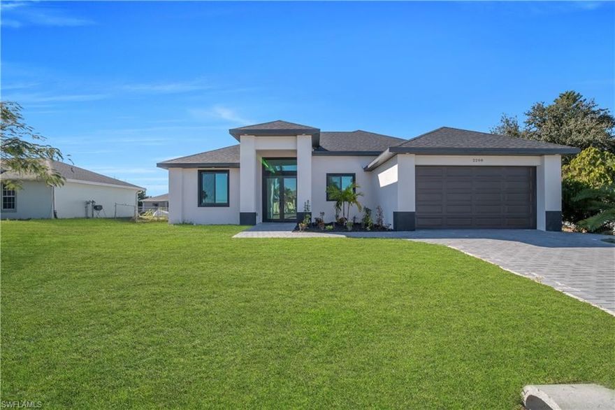 Welcome to this beautiful new construction home in the heart of Cape Coral! Centrally located and connected to city water and sewer, this move-in-ready property features 3 bedrooms and 2 bathrooms with nice, clean, modern finishes throughout. Situated in a non-flood zone area, this home offers peace of mind and convenience.  Perfect for a primary residence or investment—ready for immediate occupancy. Don’t miss this great opportunity!