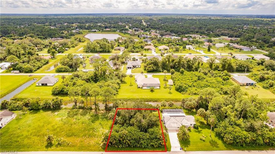 This vacant lot, measuring a generous 0.25 acres, offers the perfect space for your dream home or investment project. With its ideal location and abundant possibilities, this property is a must-see for anyone seeking a slice of paradise in sunny Florida. Lehigh Acres offers easy access to the beauty of southwest Florida, including nearby parks, golf courses, and natural preserves. Nature enthusiasts will find plenty of opportunities to explore the great outdoors. Whether you're looking to build your dream home, invest in a prime location, or simply enjoy the tranquil Florida lifestyle, this vacant lot has it all.