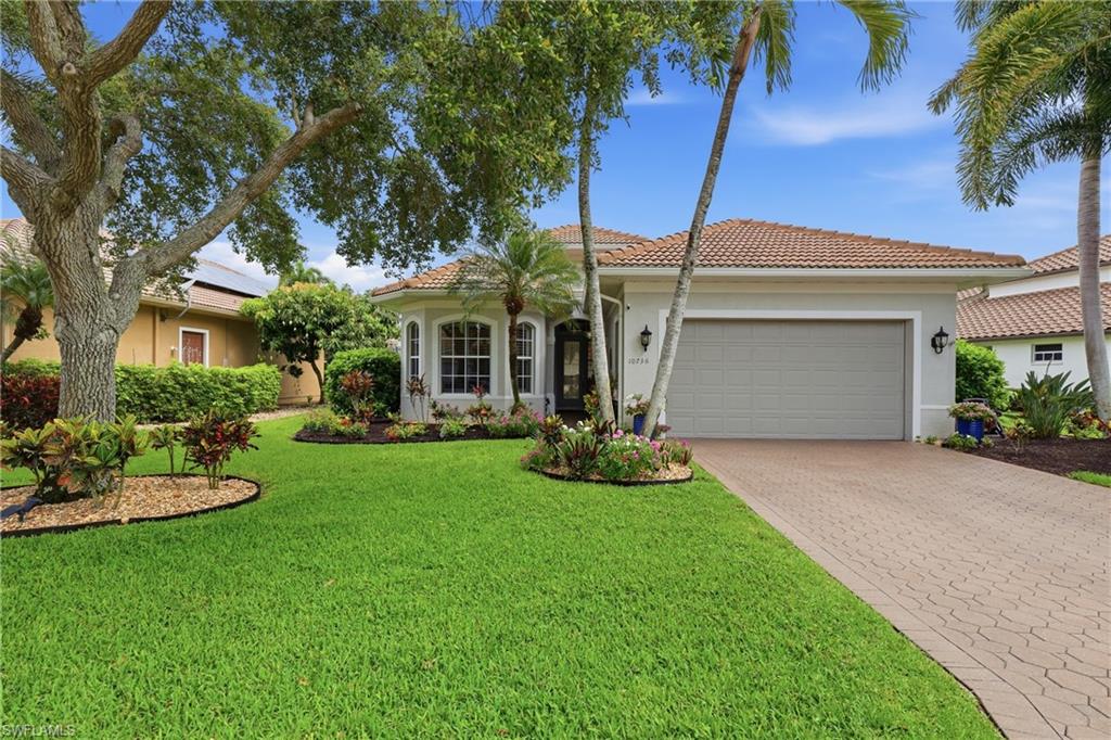 Photo of 10736 Fieldfair DR, NAPLES, FL 34119 (MLS # 226021204)