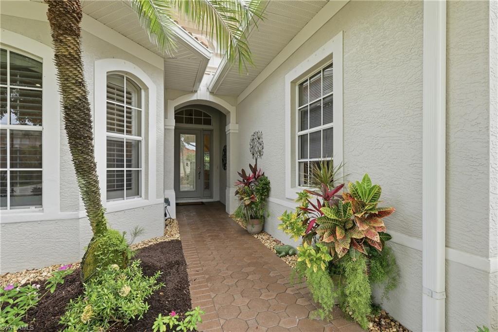 Photo of 10736 Fieldfair DR, NAPLES, FL 34119 (MLS # 226021204)