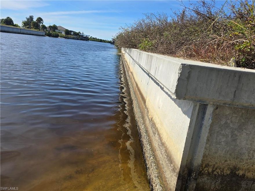 This is a DIRECT (NO BRIDGES) LOT WITH ACCESS to The GULF of MEXICO.  Start construction immediately since NEW SEAWALL has been completed.  NEWCrystal Lake Park is across the street  with highest observation area in Lee County.  Wonderful view of Boca Grande and out lying islands.  Park also has boat ramp, exercise pods, picnic pavilions and swimming in crystal clear fresh water lake.  Also, Charlotte Harbor Preserve one of the largest wildlife sanctuaries in Florida is 3/4 mile walk.