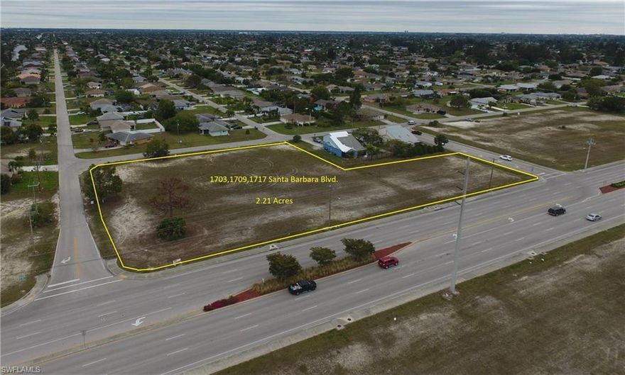 Located in the center of town serving all quadrants of Cape Coral, this 2.21 acre site goes from street to street. Approximately 450 feet of Santa Barbara Blvd. frontage. 250' of depth on the northern part of this parcel, and 125' on the southern end. Median cut allows the southbound traffic ingress to the property through SE 18th Street allowing safe connection and eliminating U-Turns. This property was subject to both a city initiated future Land Use Map Amendment and a rezoning to Commercial / Professional and Commercial respectively which is a slight change from the current designation of the CAC (Commercial Activity Center). The City had plans to adopt these proposed changes in early 2019 and in mid August these proposed plans went into effect. This parcel has water, sewer and irrigation with assessments paid in full according to the city's utility web site. Many professional and medical uses are permissible such as day care, banking, chiropractic, accounting or attorney's office, insurance, cosmetology nail salon, financial planner, dentist, plus many others.