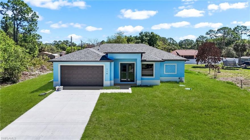 Brand new 2026 construction on an oversized half-acre lot in Lehigh Acres! This stunning single-family home offers 3 bedrooms plus a den, 2 full baths and 1 half bath across 2,228 sq ft of thoughtfully designed living space. Featuring impact-resistant windows and doors for full storm protection. Open great room floor plan with split bedrooms, tile and carpet flooring, built-in cabinets, and walk-in closet. Kitchen boasts a breakfast bar and quality finishes. All new roof, electrical, plumbing, and HVAC systems. Public water service and private septic. Oversized lot offers plenty of room to add a pool and create your dream outdoor oasis. No HOA fees, no restrictions. Not in a flood zone, and it's move-in ready.
