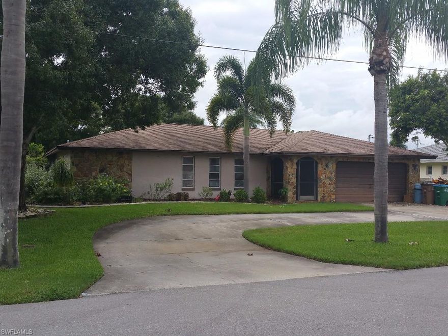 This South Cape community, is not your typical "cookie cutter" neighborhood.  Lots of original & custom built homes, including this original owner home, built on the Hole #2 on the original Cape Coral Golf & Tennis Resort   course. Over 2,300 square feet, and 4 bedrooms makes this a unique opportunity for 1st time buyers, 2nd home owners, retirees, etc... .  Enter the screened & tiled entry thru the foyer, into split living areas, formal dining, eat-in-kitchen, and sliders to the private pool & spa retreat.  A custom built wet bar features a granite countertop, and all the amenities needed to entertain by the pool!  Inside, the options are many with 3 Guest Bedroom's.  The pool bath & 3rd Guest BR can be closed off by Pocket door for Mother-in-Law suite.  The original laundry room was converted to a small office, but could easily be changed back.  Some TLC needed, but City Utilities are PAID, and a couple nice upgrades, make this home ready for you to claim your own piece of Paradise!