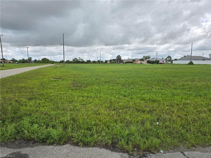 Cleared Multi-Family (MF) Residential Lot in North East Cape Coral. This is standard 80x125 (1/4 Acre) Residential Lot. Build your DUPLEX home here! Conveniently located in a quiet neighborhood, close to shopping, local eateries and entertainment. This Land is part of the North 1 East 2025 City Utilities Expansion Project. Cornet Lot with potential to have a second driveway on the side street.