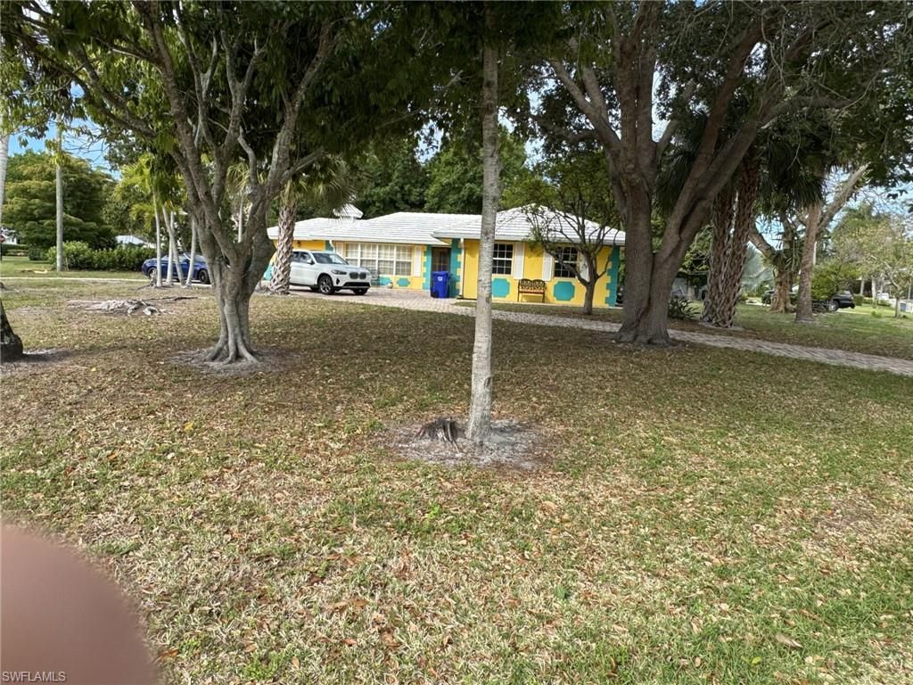 Photo of 780 Fountainhead LN, NAPLES, FL 34103 (MLS # 226015884)