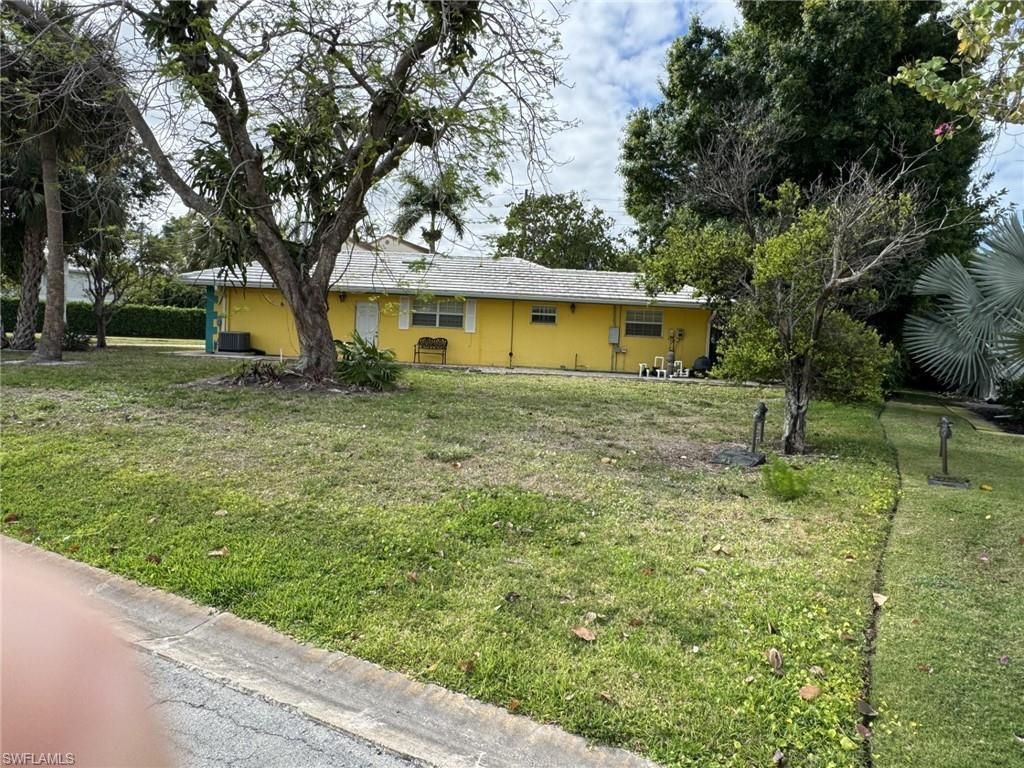 Photo of 780 Fountainhead LN, NAPLES, FL 34103 (MLS # 226015884)