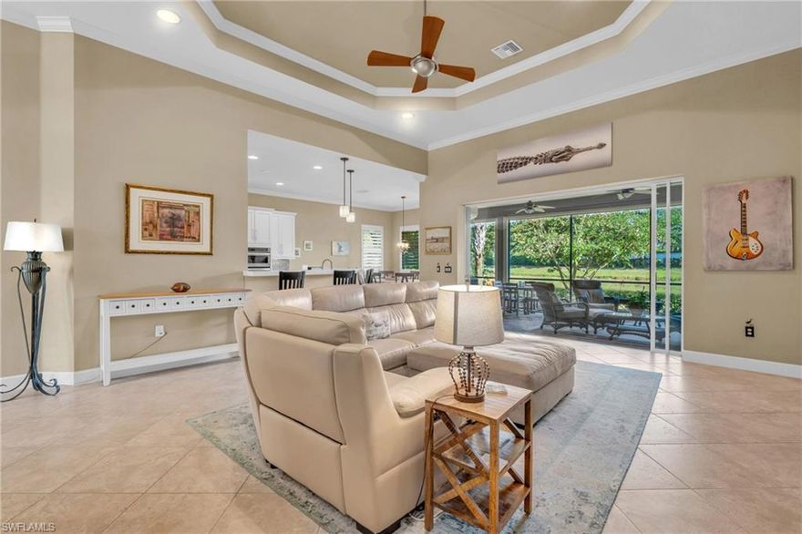 Situated across from Bonita Springs High School on an oversized corner lot in the front of the community, next to the fitness center and community pool is this move in ready Turnkey Furnished home. The spacious home offers a peaceful lakefront view and is nestled in a serene and peaceful neighborhood in Hawthorne. You will find that the rooms offer a blend of comfort, convenience and style. 

As you step inside, you will immediately notice the bright and airy open floor plan, with high trey ceilings and large windows that allow for plenty of light. There is an Awesome 65 inch Samsung QLED new television with a Vizio subwoofer and two rear speakers, the soundbar can be used as a Bluetooth speaker.

The primary suite is a true retreat with two generous walk in closets, a dual quartz sink area with a large walk in shower. There are three other bedrooms and a study/den area with a pull out couch and desk area. 
Throughout the gently used home there are very tasteful furnishings from Matter Brothers and Palm Casual, all purchased within the last four years. Each room offers a whimsical touch for seasonal or full time living in Hawthorne. The outside patio has new Kevlar shades with a nicely landscaped backyard. 

Some of the features of the home include a gourmet kitchen with wide quartz countertops, stainless steel Kitchen Aid combo convection oven with electric induction cooktop, microwave and dishwasher. There is a large French door pantry, the glassed in dining area with three sided metered windows is perfect for larger groups for dinner.