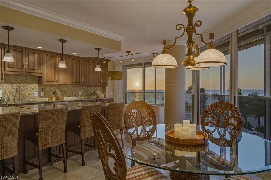 Perfectly positioned along the sugar-sand shoreline of Park Shore, this three-bedroom, three-bath beachfront residence at Savoy offers an exceptional opportunity to enjoy direct views of the Gulf and unforgettable sunsets that unfold nightly across the horizon. Floor-to-ceiling windows frame the water from the main living areas, filling the home with natural light and a constant connection to the beach below. The open layout is designed for easy coastal living, with a spacious kitchen that features a large center island, solid wood cabinetry, and stainless steel appliances, all flowing seamlessly into the living and dining areas. These central spaces are oriented toward the Gulf, making the views the true focal point of the home and creating an inviting setting for both everyday living and entertaining. A split-bedroom floor plan provides comfort and privacy for owners and guests alike. The owner’s suite is generously sized, offering peaceful Gulf views and dual walk-in closets. On the opposite side of the residence, the guest suite enjoys its own private balcony, walk-in closet, and ensuite bath—an ideal retreat for visitors. The third bedroom offers flexible, spacious accommodations, with its own balcony and convenient access to a nearby full bath. With neutral finishes throughout and a layout that maximizes light, views, and beachfront living, this residence presents a rare chance to personalize a coastal retreat in one of Naples’ most desirable neighborhoods—where the beach, the sunsets, and the Gulf are always front and center. Savoy residents enjoy a 24-hour lobby attendant, a large pool area, fitness facility, within steps of the beach and just minutes to the shopping and dining at Venetian Village and Park Shore Marina nearby. Don't miss your opportunity to experience Naples beachfront living at its finest.