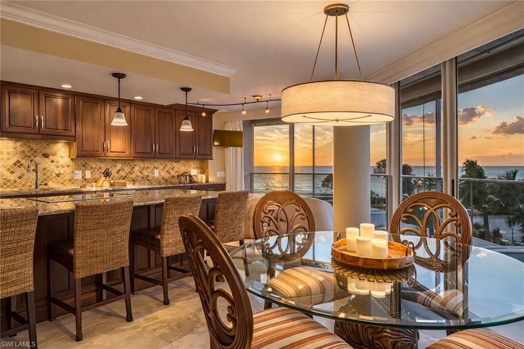 Photo of 4041 Gulf Shore BLVD N #303, NAPLES, FL 34103 (MLS # 226006570)