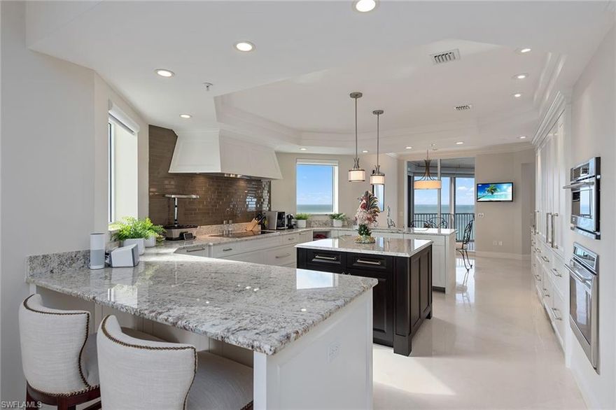 Gorgeous Gulf and Sky views! This bright & light high floor 01 floor plan sits directly on the beach in the private gated community of Bay Colony in Pelican Bay. Featuring unobstructed panoramic views of the Gulf of Mexico through floor-to-ceiling glass sliders off of the main living area, separate breakfast area and master bedroom. This is a highly sought after design which welcomes you into an elegant entry foyer and spacious living area boasting polished marble floors, elegant moldings, lighting & trim and a separate dining area. The open chef’s kitchen and den area offer plenty of room for entertaining family and guests including 2 full guest bedrooms, both with en suite baths. Extra additional storage at garage level. The Biltmore amenities include an impeccably renovated lobby with 24-hour manned front desk, two guest suites, fitness center, social rooms, and a resort-style pool. Bay Colony residents enjoy the use of their own private newly renovated beach club and restaurant, a tennis club, as well as the use of the amenities of Pelican Bay. Private golf memberships are available separately. The Biltmore makes a perfect home for an unsurpassed Naples lifestyle!