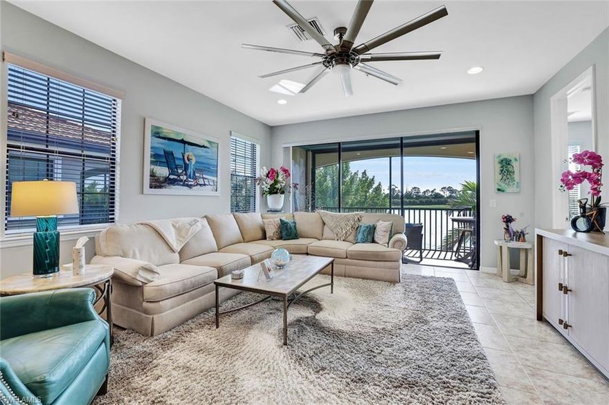 3 Bedroom+Enclosed Den Coach home with shimmering lake views, tall ceilings, 8' doorways, triple sliding glass doors, large walk-in pantry, electric hurricane screens and attached garage w/ overhead storage racks + dedicated driveway. West of I-75 with quick access to Coconut Point mall, The Promenade, Downtown Bonita Springs, Barefoot & Bonita Beaches, RSW and more. The gated community of Paloma offers tennis & bocce courts, a resort-style pool, an exercise room, events and a residents' activity calendar. Fees cover lawn care, irrigation, water & sewer, gated entrance, and professional management. No CDD tax and no lender-required flood insurance. Being sold with two TVs and some furnishings. Condo allows for up to two dogs (non-aggressive breeds). Second floor unit, which means there are stairs. Activities within Paloma include canasta, mahjong, poker night, ladies luncheons, mens luncheons, water aerobics, monthly coffee meet-up, bridge club and other opportunities to meet neighbors and make friends.