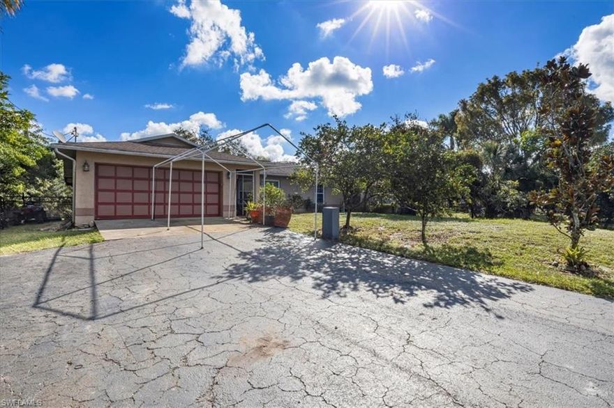 This 3 bedroom 2 bath 2 car garage concrete block home offers an unparalleled opportunity for serene living with horses permitted on its sprawling 1.14 fenced acres, providing outdoor enjoyment. The location affords close proximity to grocery stores, parks, schools and shopping, ensuring convenience for your everyday needs. Inside, the home features a granite counter tops, tile floors throughout, A/C 6 years new, water heater 3 years new. The spacious, large screened lanai invites relaxation in a private outdoor setting. This property seamlessly blends tranquility and accessibility, making it an ideal choice for those seeking an investment property or fixer-upper. Make it your own and enjoy a unique and harmonious life style.