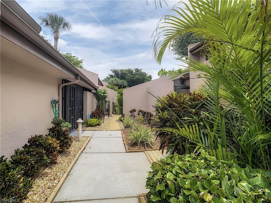 Magnificent Townhome over looking the 15th tee and lake. One of  best Guard- Gated Community in fort myers. 252 Acres of a tropical oasis with unlimited golf , tennis boating, swimming pools and fun-active lifestyle all year long. The River is just a short stroll away. This two-story is all you would ever want, the finishing touches have already been completed, When entering it only takes a moment to stand in the hall and begin to appreciate the beauty of this home. It is the spot where you are offered a glance of the majestic loftiness, whispering what is to come, and the frame the vast green landscape and water view that supports this tranquil magnificent place. The chief-type Kitchen has gorgeous cabinetry that flows for both storage and serving into the kitchen special reception/gathering area, Both area's overlook and connect to a private wine tasting retreat with skylights and separate entrance. Porcelain diagonal tile through-out the first floor really create the flow and comfort of this extraordinary Home