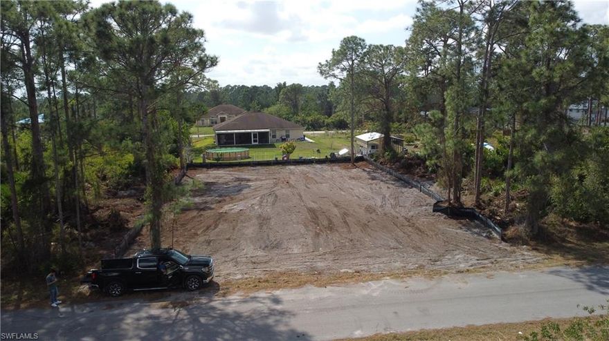 Vacant lot for sale with approved permits. Clean title, DOES NOT HAVE WETLANDS OR INVASIVE SPECIES. Clean lot with approved permits ready to build a 1400 sqft 3bedroom-3bathroom house that is proven to sell quick because it has the third bathroom behind the garage for an easy conversion to a studio and main house stays as a 3/2. Power lines on the same street and paved road. Lot has been cleared. Send offers to raulbrealestate@gmail.com or text 305-904-8567.