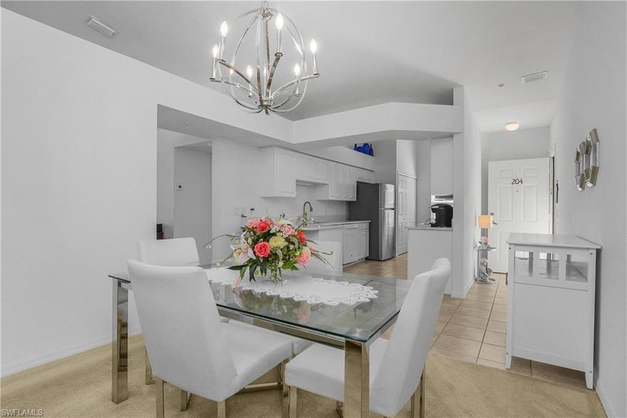 Welcome to this well-kept corner unit 2-bedroom + den, 2-bath condo in the gated community of Bonita Fairways. This inviting residence features vaulted ceilings and a comfortable layout, and comes partially furnished, making it easy to move right in or personalize to your taste. The spacious kitchen is filled with natural light and features quartz countertops, while the interior offers carpet throughout the main living areas, bedrooms, and den, with tile flooring in the kitchen and bathrooms.

The den provides flexible space for a home office, reading nook, or guest accommodations. The primary suite boasts a spacious walk-in closet and a private bathroom with dual sinks, guest bedroom and bath are positioned separately for added privacy. Step out onto the screened lanai and enjoy peaceful views of the landscaped grounds and pool area, all just a short walk to the community pool and main clubhouse.

This unit also includes hurricane storm shutters for added peace of mind. A full-size washer and dryer are conveniently located in the unit, and the property includes a detached carport (#204). As a resident, enjoy the privately owned 18-hole public executive golf course within Bonita Fairways (pay-per-play, no mandatory membership), as well as exclusive access to a resort-style pool, spa, and resident’s pool cabana. The broader Bonita Fairways community offers extensive amenities, including another resort-style pool and spa, tennis and pickleball courts, bocce, a state-of-the-art fitness center, pro shop, Bobcat Café, gated entry, and more.

Perfectly situated for easy access to everyday conveniences grocery stores, banks, gas stations, high-end dining, shopping, entertainment, and a seasonal farmers market are all within walking distance. The beautiful Gulf beaches are just 5.5 miles away, and RSW Airport, the Shoppes at Mercato, and Coconut Point Mall are only a short drive. Experience the lifestyle you’ve been dreaming of don’t miss the opportunity to make this exceptional condo your new home.